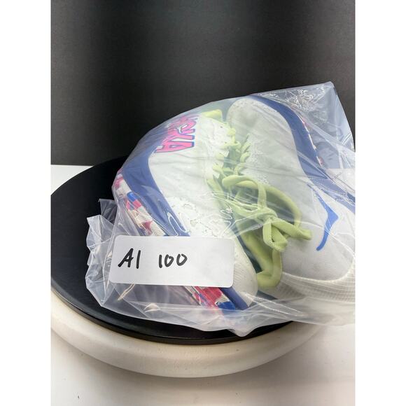 Hoka One One White Athletic Shoe with Blue and Neon Yellow Accents main image 4